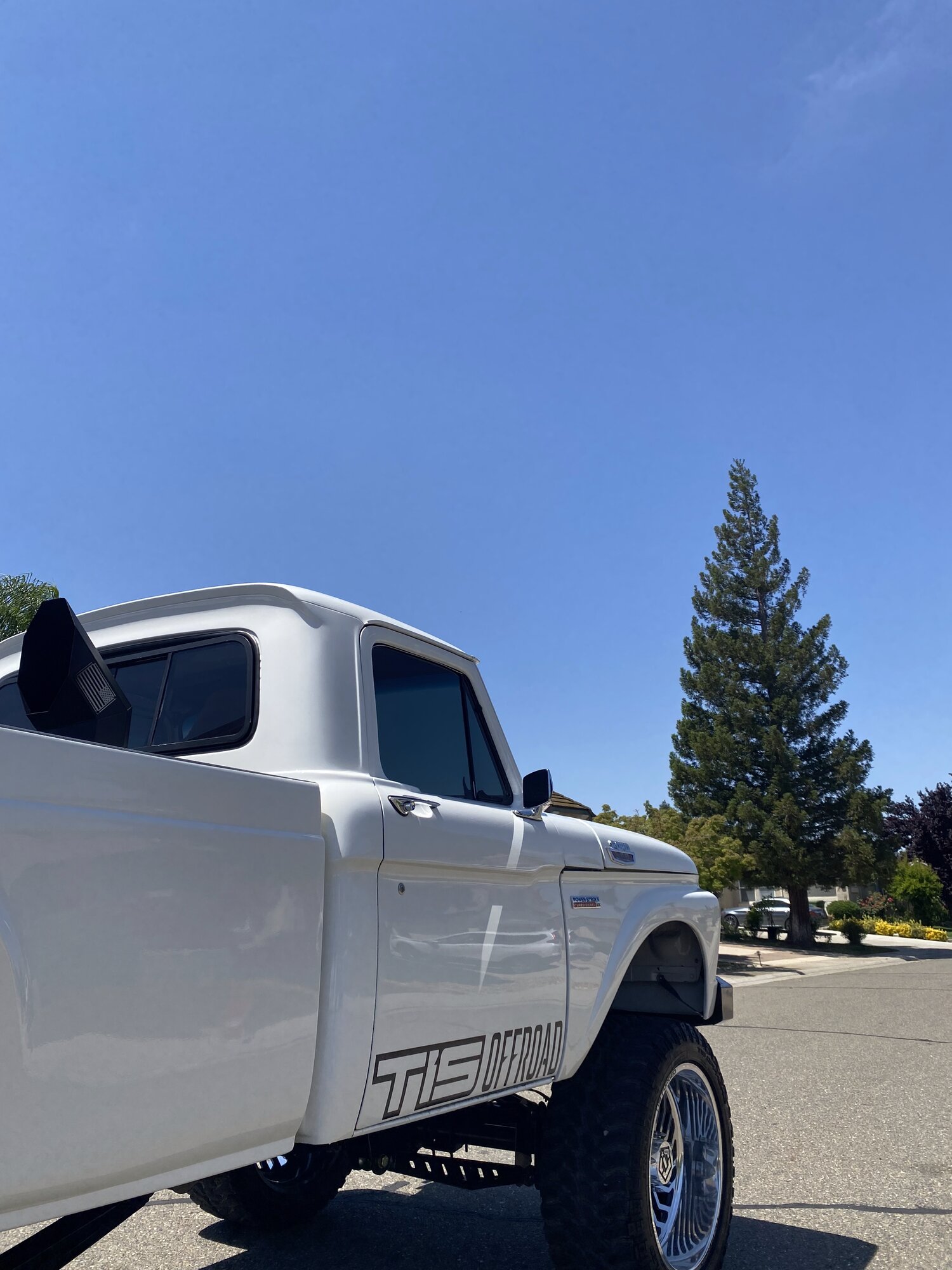 White truck exterior finish after wax or sealant protection